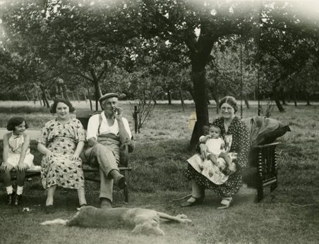 Rear of 'Orchardville', Daws Heath Road. From left: Sheila Chalk, next Rose Chalk, Herbert Angelo Chalk, Alice Jane Chalk with Gillian Anne Chalk on her knee. The dog was also called Sheila. Rear of 'Orchardville', Daws Heath Road. From left: Sheila Chalk, next Rose Chalk, Herbert Angelo Chalk, Alice Jane Chalk with Gillian Anne Chalk on her knee. The dog was also called Sheila. | Gill and Colin Blackall