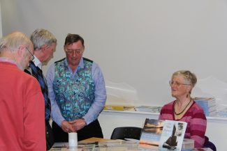 Nick Ardley talking with visitors at the fair.