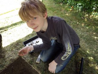 James shows the pottery he found | Terry Barclay