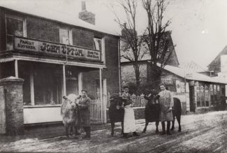 Photo of lodge as a butcher's shop and showing grocer's shop | Sandra Harvey