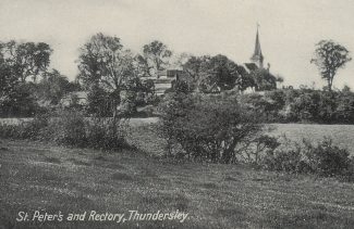 After the harvest, the rectory and distinctive broach-spire of St Peter's in the background | H&TCA